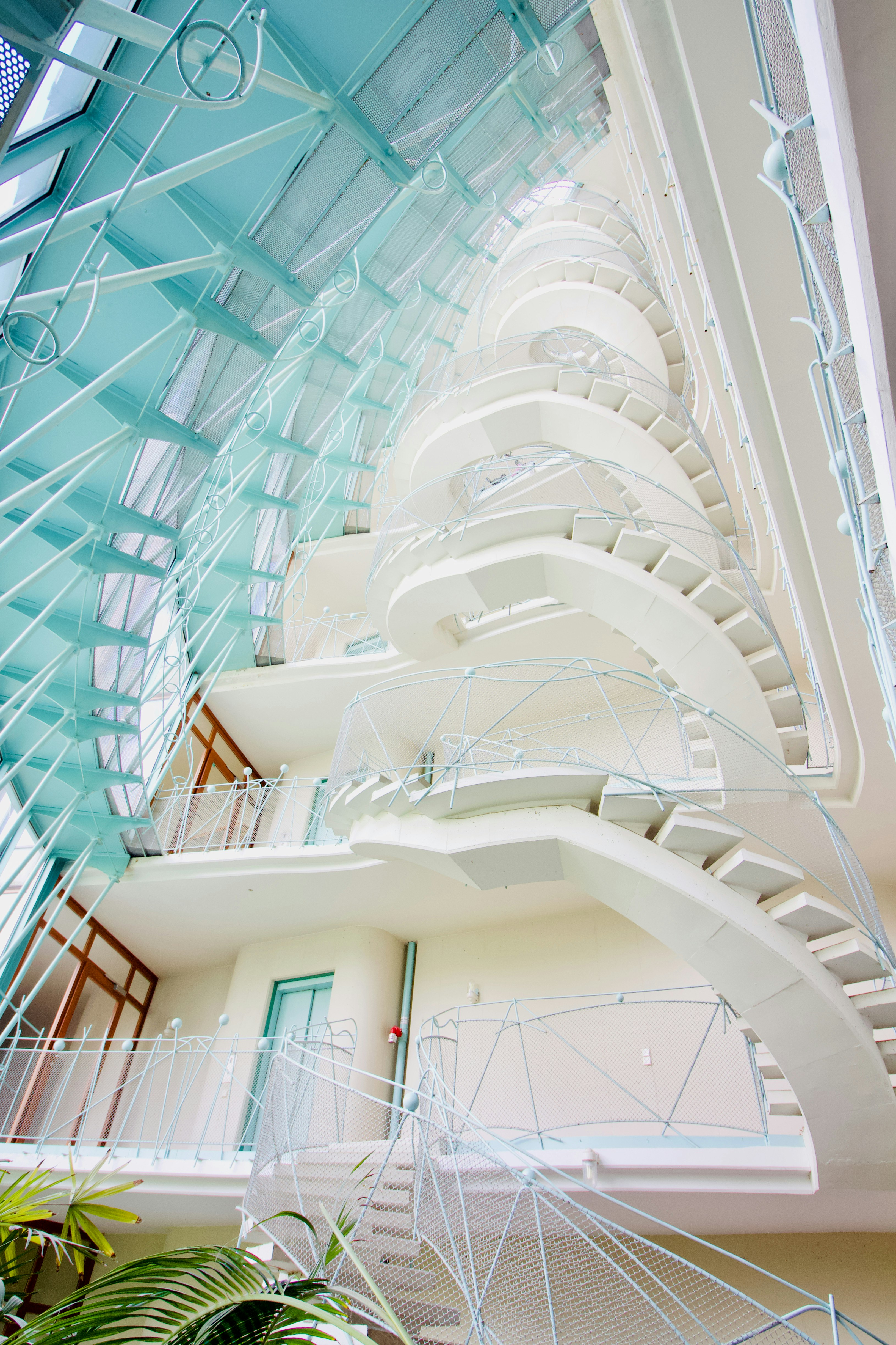 white concrete building with glass roof